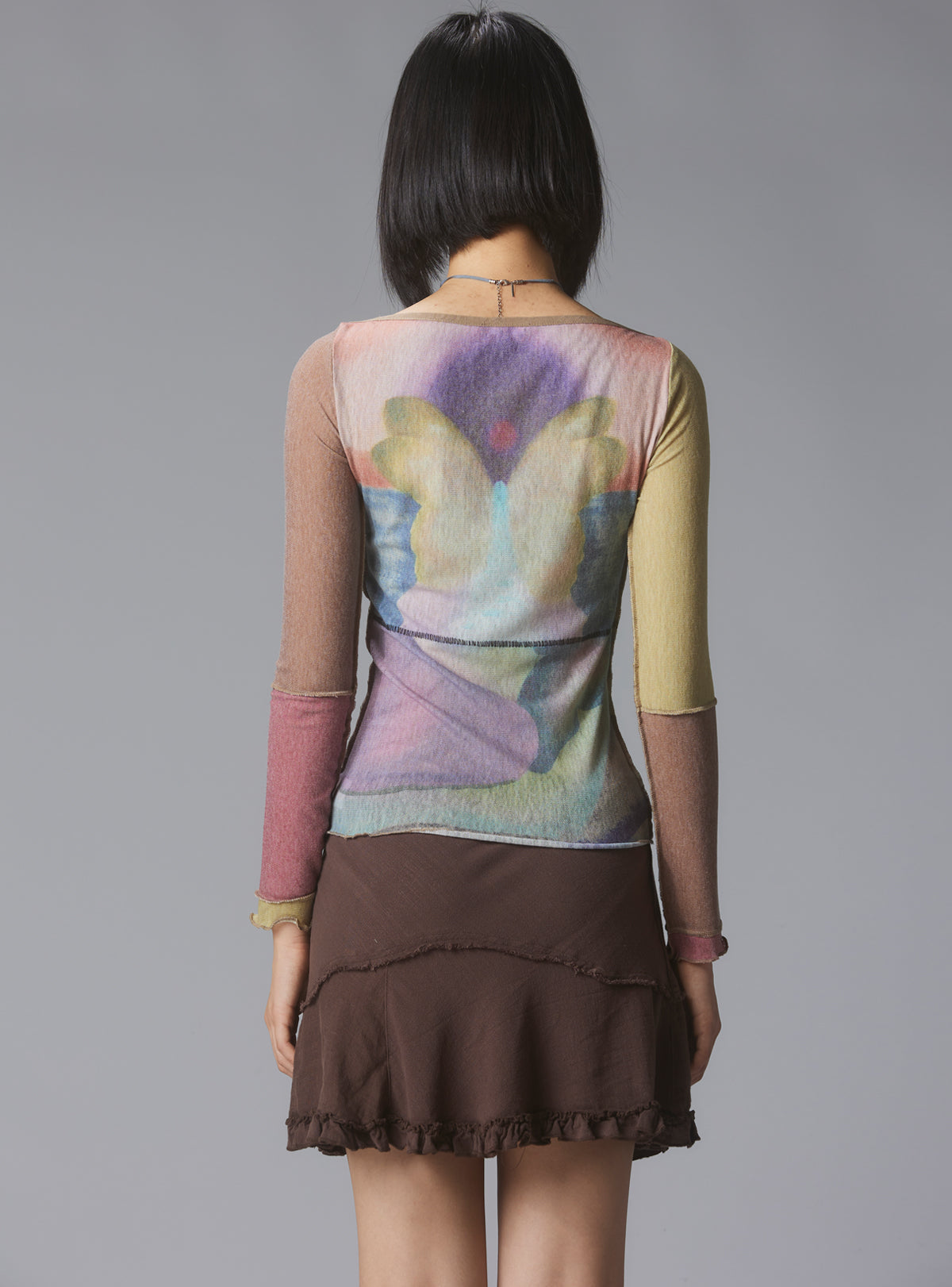 UNIF Skye Top Y2K allover-print mesh top with custom artwork