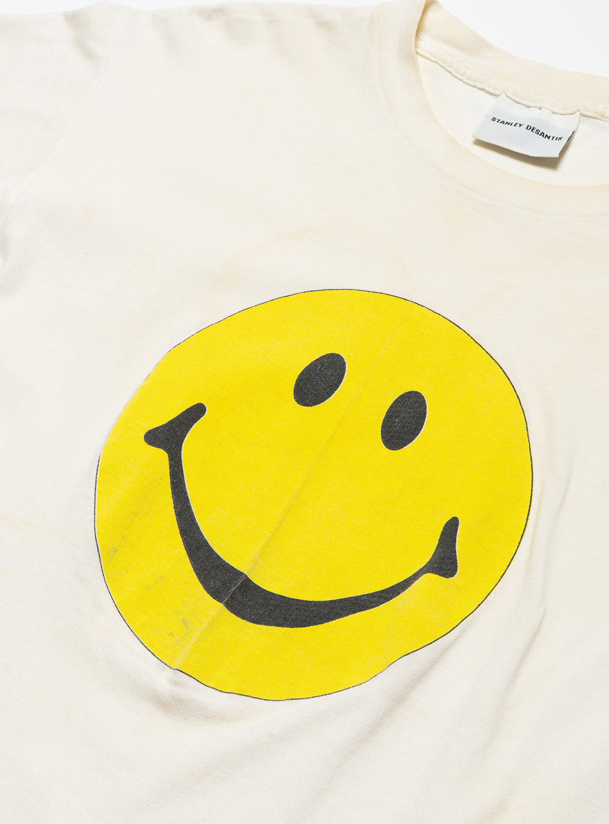 UNIF Vintage Stanley Desantis Smiley Face Tee