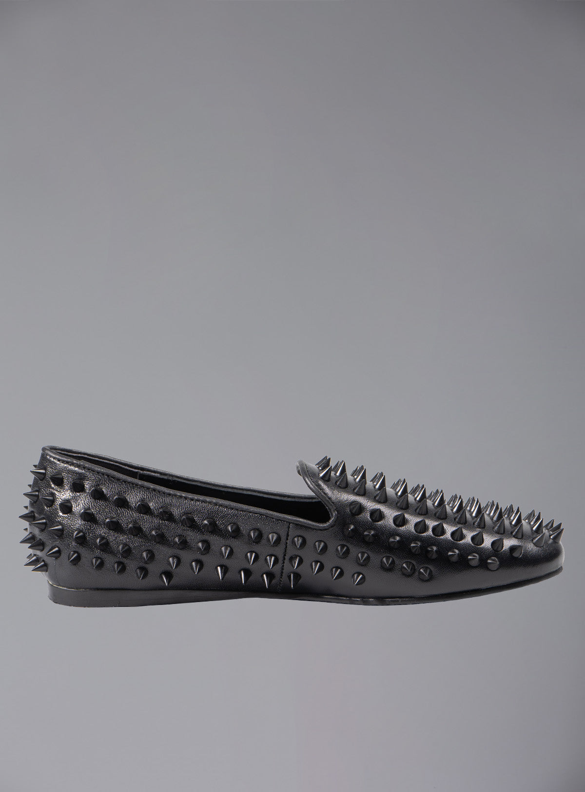 UNIF UNIF Hellraiser spiked slip on loafer in tonal on colorway.