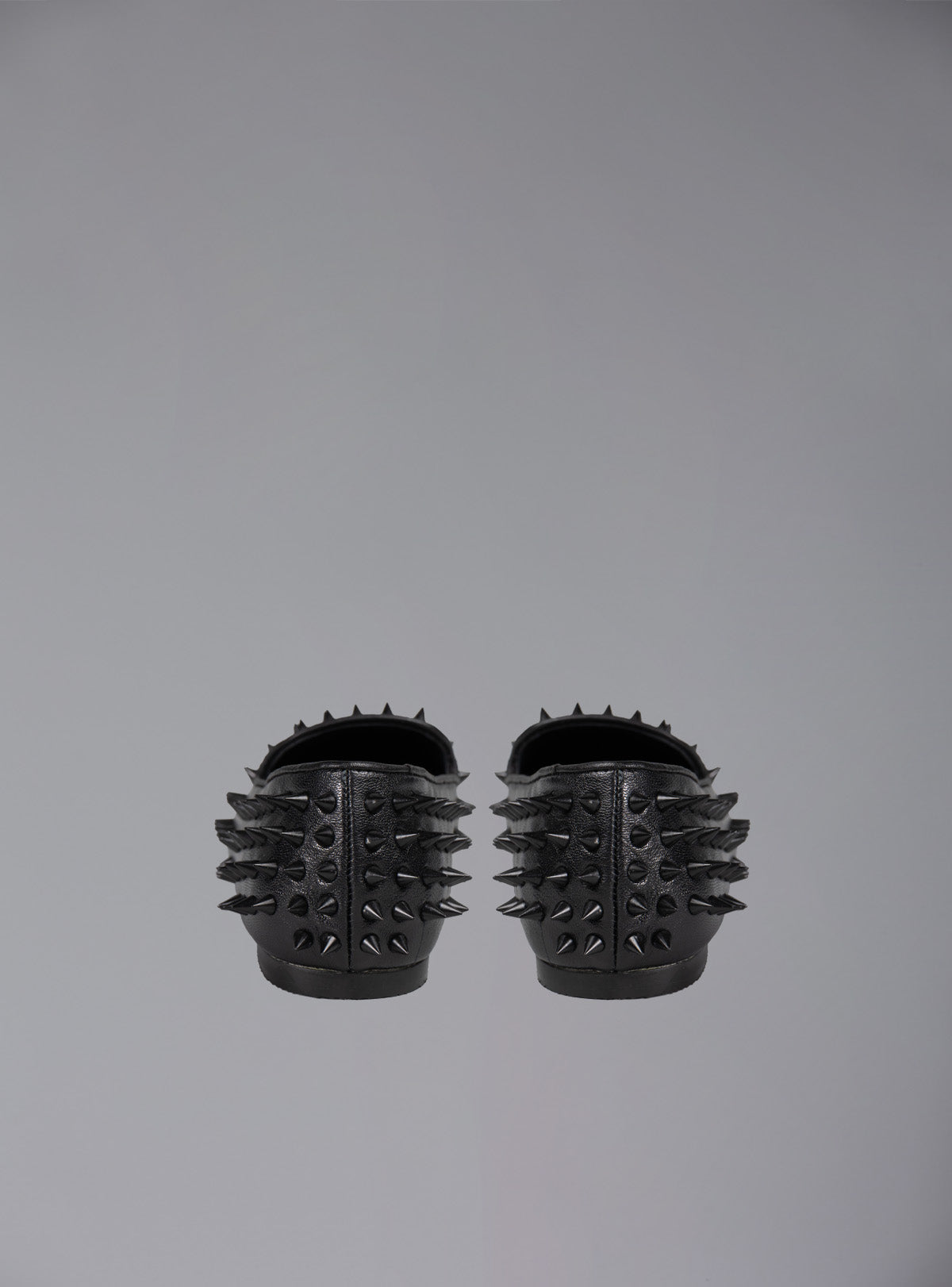 UNIF UNIF Hellraiser spiked slip on loafer in tonal on colorway.